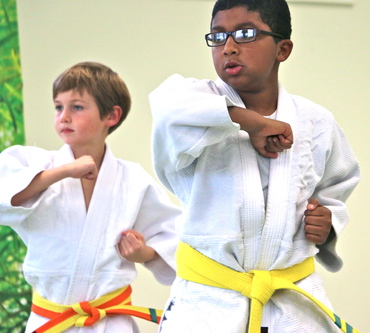 Two Ann Arbor Kids Karate students practicing kata